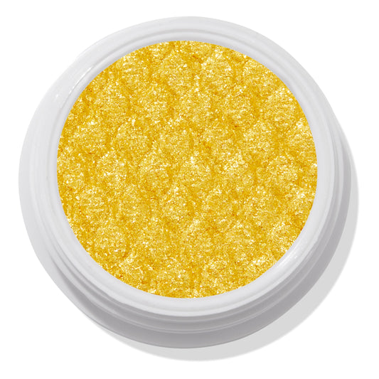 ColourPop Super Shock Shadow Tankini shows a vibrant metallic yellow‑gold pan sparkling with a quilted, bouncy texture, sitting open in a white jar against a clean white studio background.